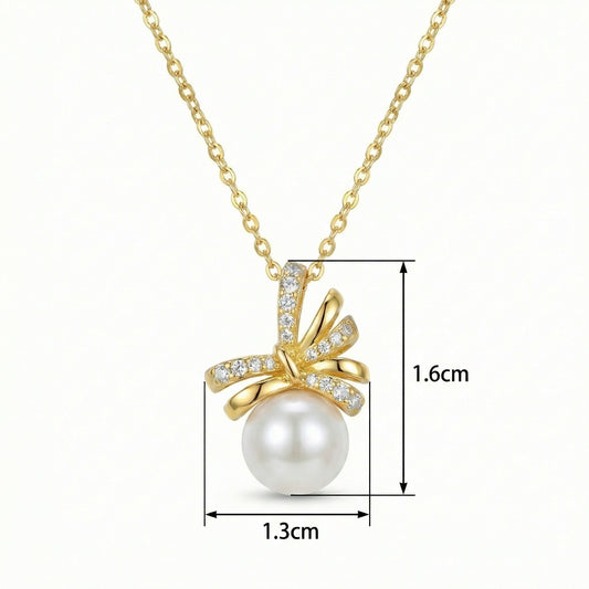 925 Sterling Silver Elegant Pearl Ribbon Pendant Necklace with Shimmering Stone Accents