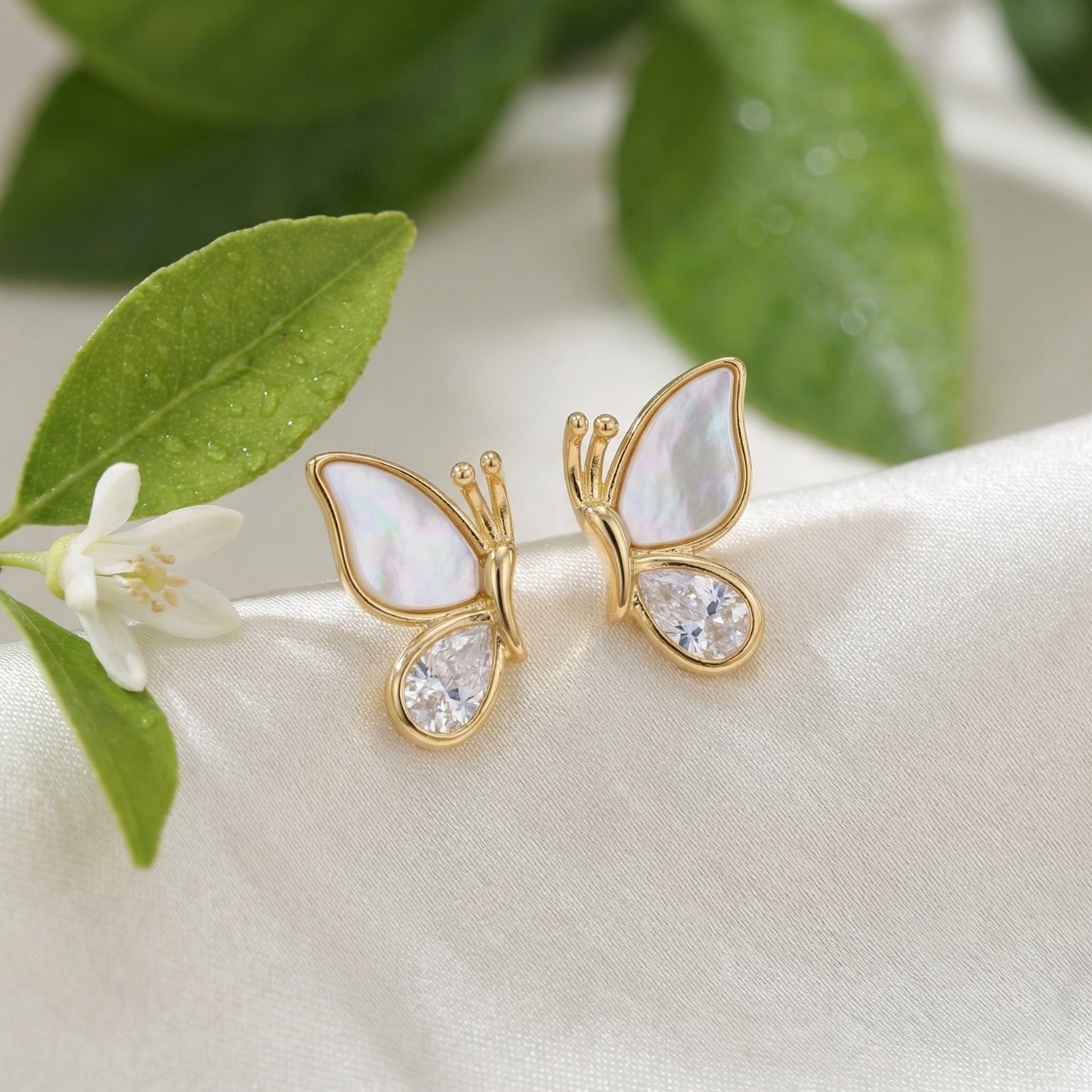 925 Sterling Silver Elegant Mother of Pearl and Sparkling Pear-Cut Crystal Butterfly Wing Stud Earrings
